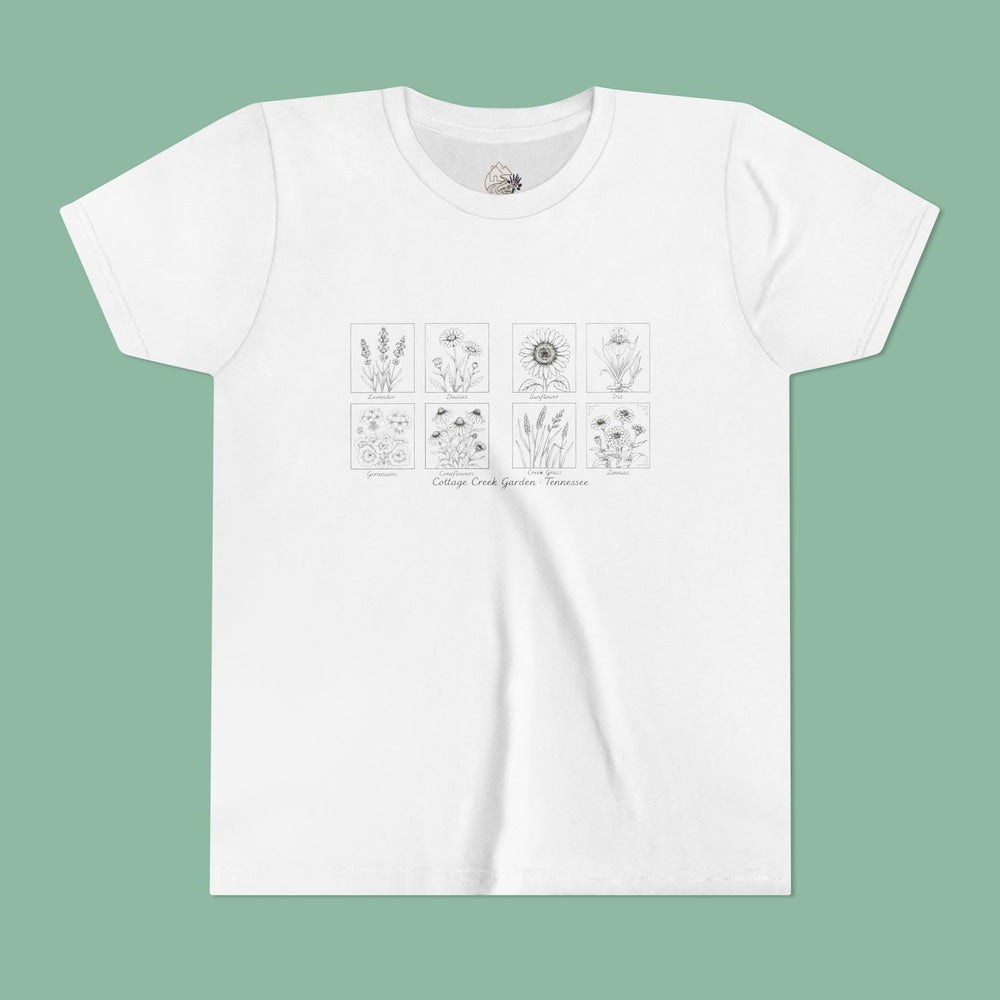 Youth tee with a grid of hand-drawn Cottage Creek Garden botanical illustrations