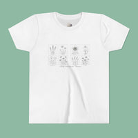 Youth tee with a grid of hand-drawn Cottage Creek Garden botanical illustrations
